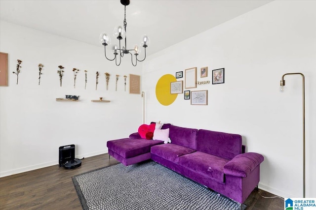 living room featuring a chandelier and dark hardwood / wood-style flooring