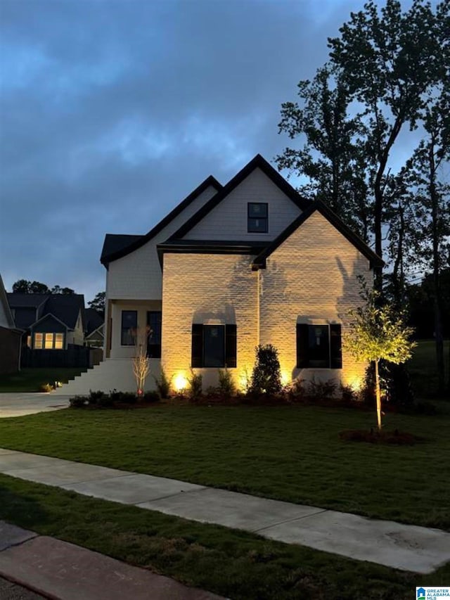 view of front of home with a front yard