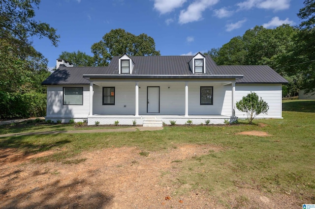 view of front of home featuring a front lawn and a porch