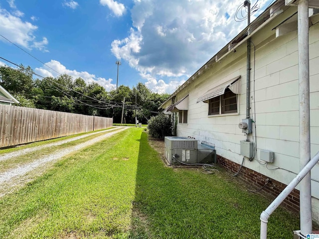 view of yard featuring central AC