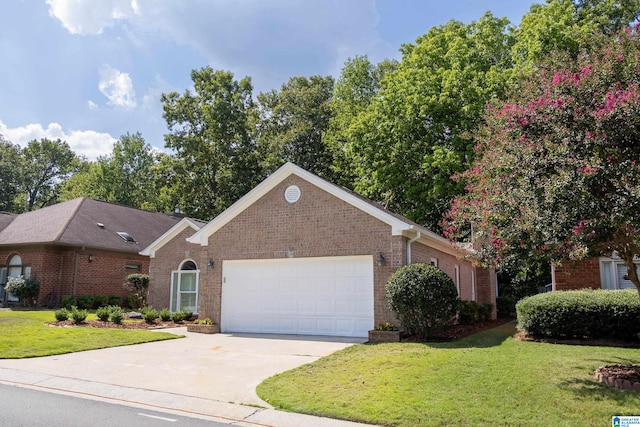 ranch-style house with a garage and a front yard