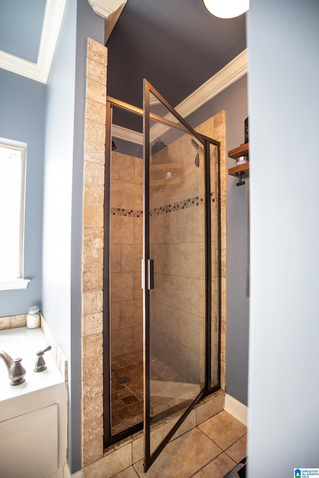 bathroom featuring crown molding, tile patterned floors, and separate shower and tub