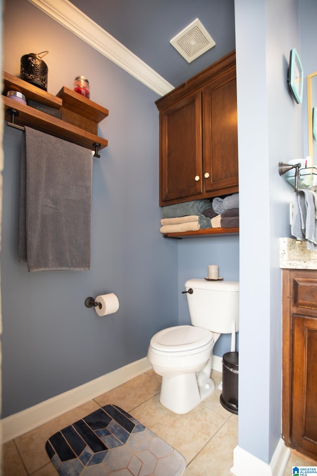 bathroom featuring tile patterned flooring, tasteful backsplash, ornamental molding, vanity, and toilet