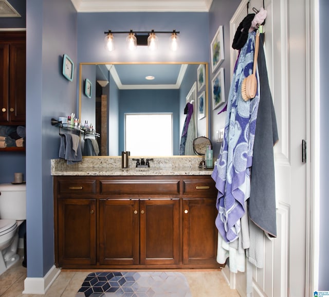 bathroom featuring crown molding, tile patterned flooring, vanity, and toilet