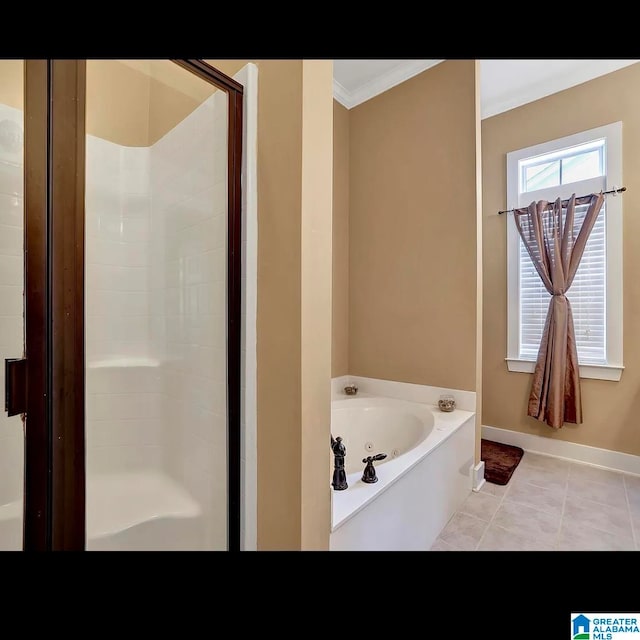 bathroom featuring independent shower and bath, tile patterned floors, and crown molding