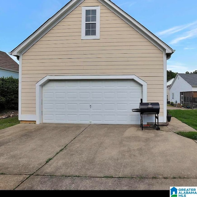 view of property exterior featuring a garage