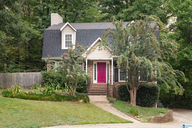 view of front of house with a front lawn