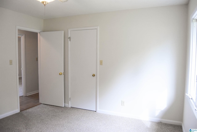 unfurnished bedroom with carpet