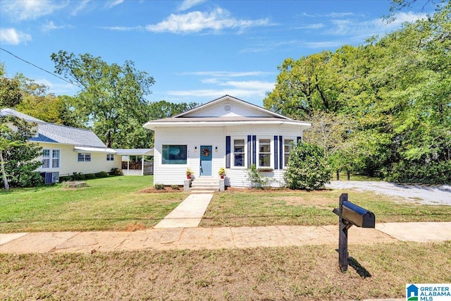 view of front of home with a front yard