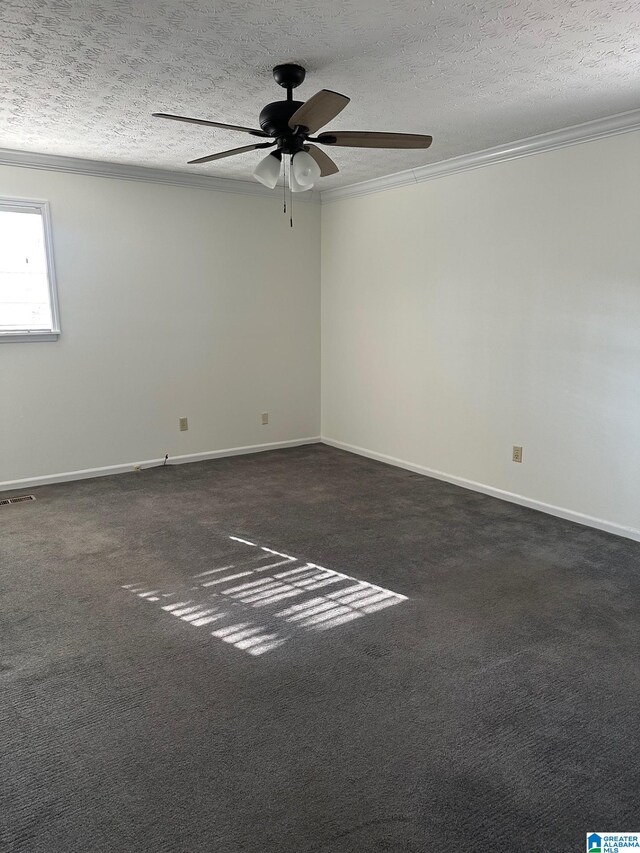 carpeted spare room with a textured ceiling, ceiling fan, and ornamental molding