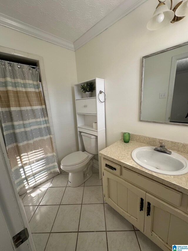 carpeted spare room featuring crown molding, visible vents, ceiling fan, and a textured ceiling