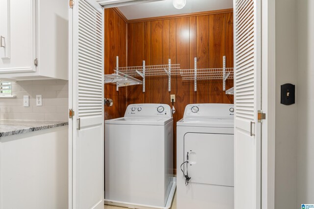 laundry room featuring independent washer and dryer and laundry area
