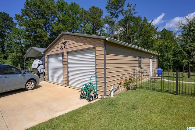 garage with a yard