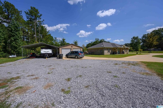 view of yard with a carport