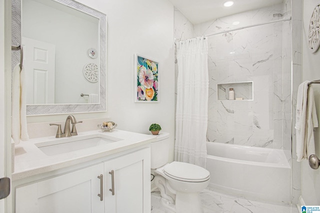 full bathroom featuring vanity, shower / bath combo with shower curtain, and toilet