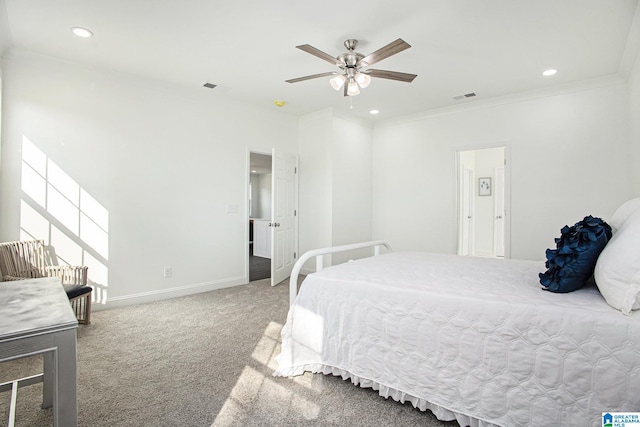 carpeted bedroom with crown molding and ceiling fan