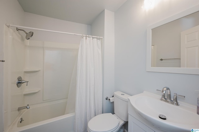 full bathroom featuring vanity, toilet, and shower / bath combination with curtain