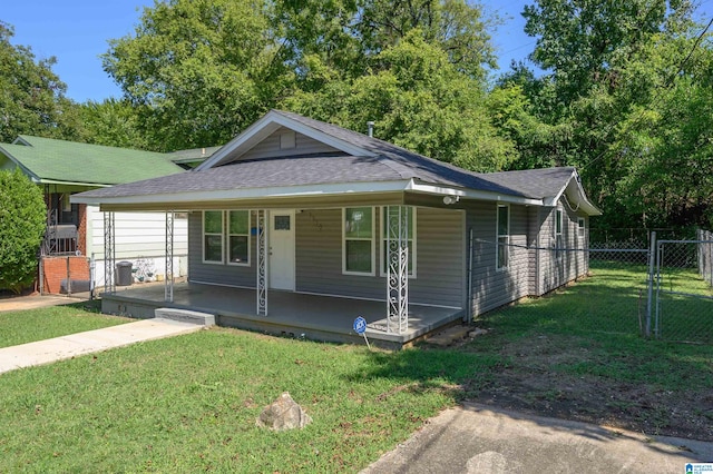 view of front of property with a front yard and a porch