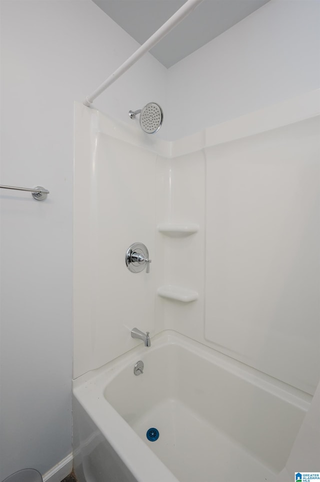 bathroom with shower / tub combination