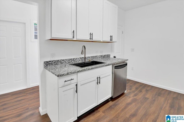 kitchen featuring dark hardwood / wood-style floors, dishwasher, sink, and white cabinets