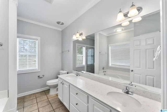 bathroom featuring vanity, ornamental molding, a tub to relax in, tile patterned floors, and toilet