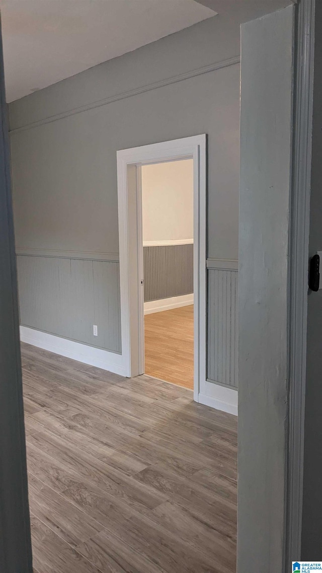 unfurnished room featuring hardwood / wood-style flooring