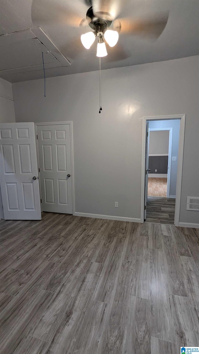 interior space featuring ceiling fan and hardwood / wood-style floors