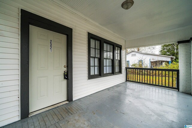 property entrance with a porch