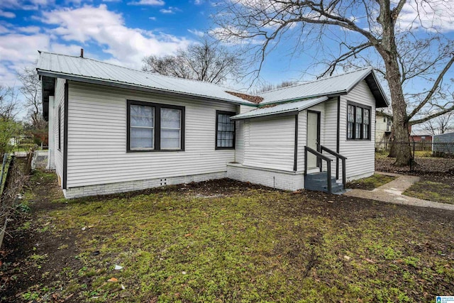 exterior space with a front yard