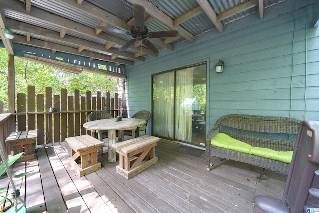 wooden terrace featuring ceiling fan