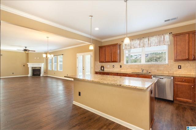 kitchen featuring dishwasher, a fireplace, dark wood-type flooring, and a center island