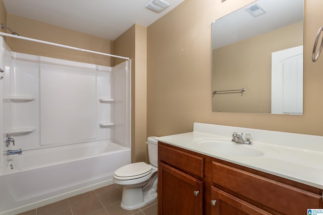 full bathroom featuring  shower combination, vanity, tile patterned flooring, and toilet