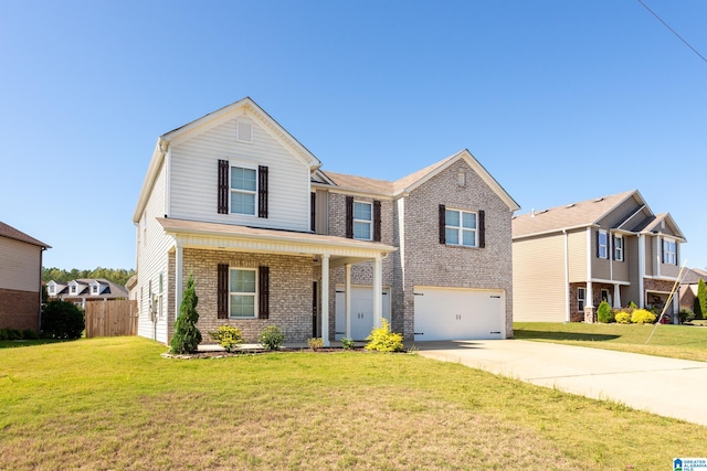 view of front of property with a front lawn and a garage