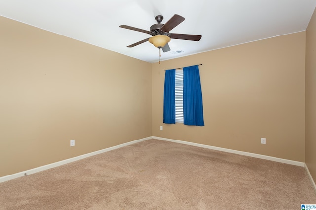 empty room with carpet and ceiling fan