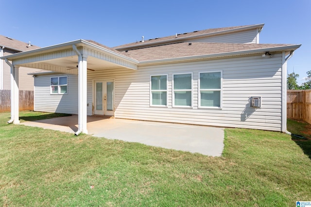 back of house with a yard, ceiling fan, and a patio area