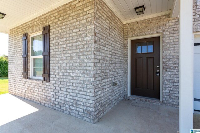 entrance to property with covered porch