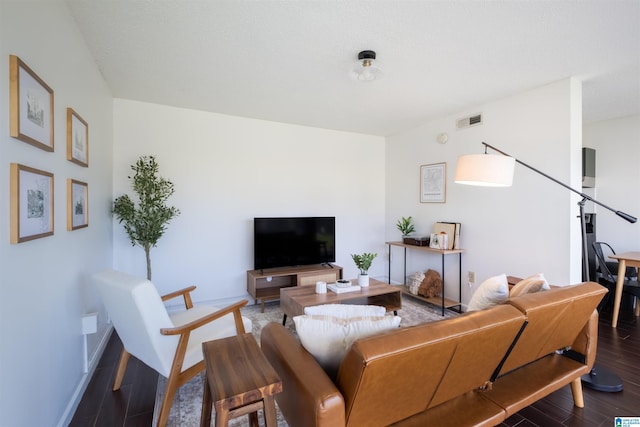 living room featuring dark hardwood / wood-style floors