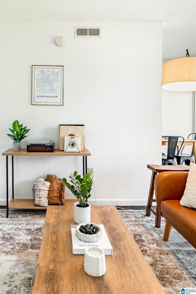 dining area with a textured ceiling