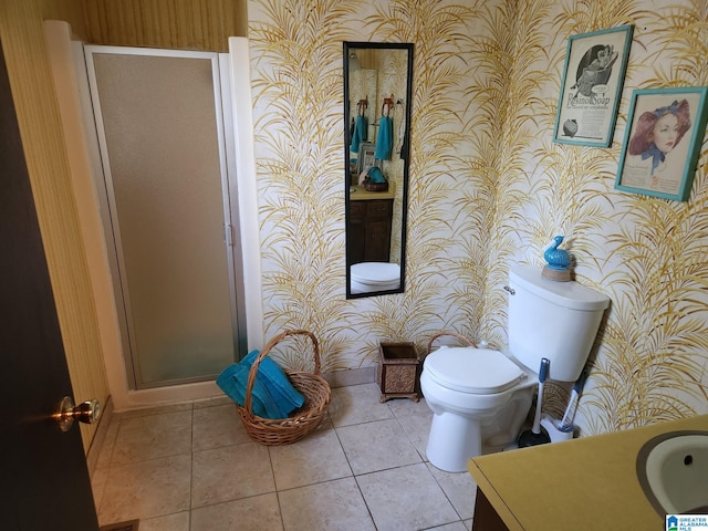 bathroom with walk in shower, tile patterned flooring, vanity, and toilet