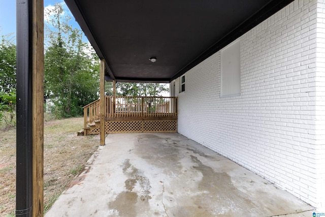 view of patio / terrace featuring a wooden deck