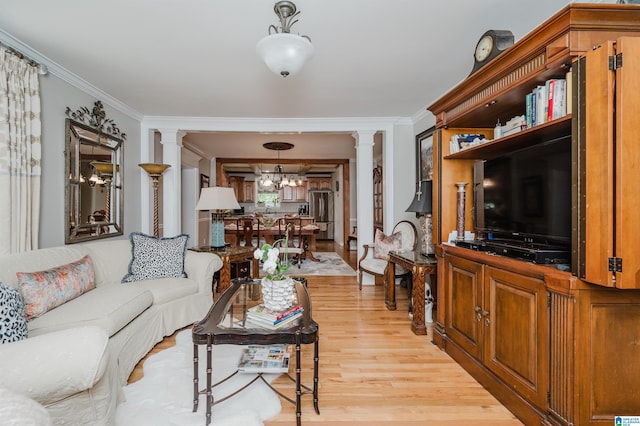 477 Seales Rd, Helena, AL 35022 - living room with ornate columns, ornamental molding, and light wood-style floors