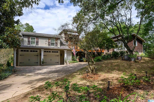 view of front of property with a garage