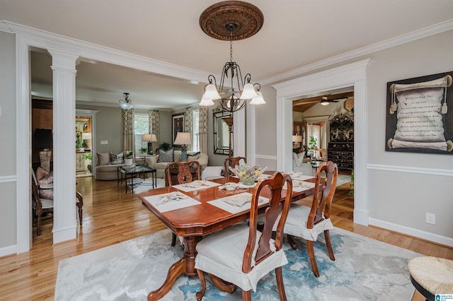 477 Seales Rd, Helena, AL 35022 - dining area with crown molding, baseboards, light wood-type flooring, and ornate columns