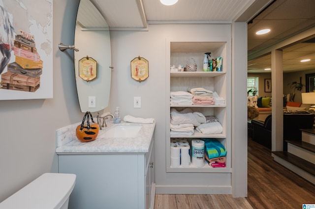 477 Seales Rd, Helena, AL 35022 - bathroom with toilet, recessed lighting, vanity, and wood finished floors