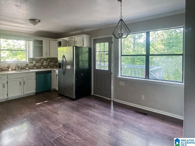 kitchen with stainless steel fridge, dishwasher, decorative light fixtures, dark hardwood / wood-style floors, and sink