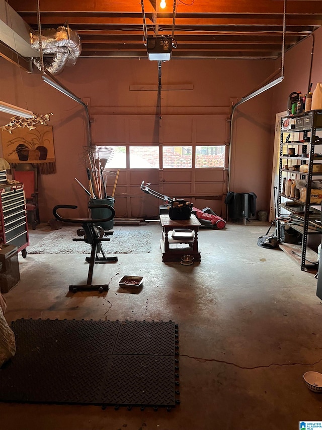 garage featuring a garage door opener