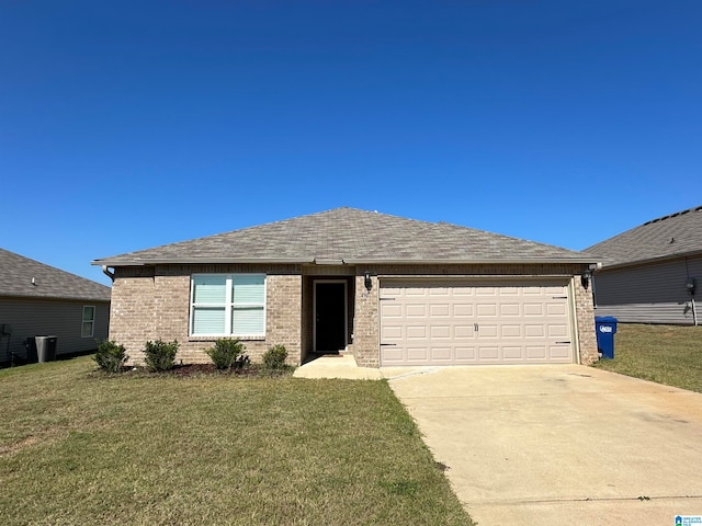 single story home with a front lawn and a garage