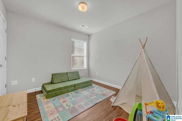 rec room featuring dark hardwood / wood-style flooring