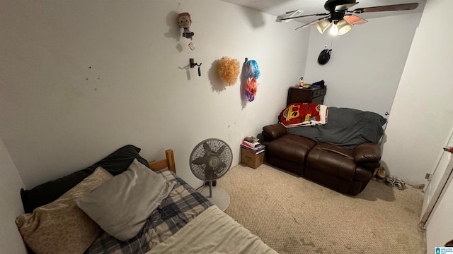 interior space featuring ceiling fan and carpet flooring