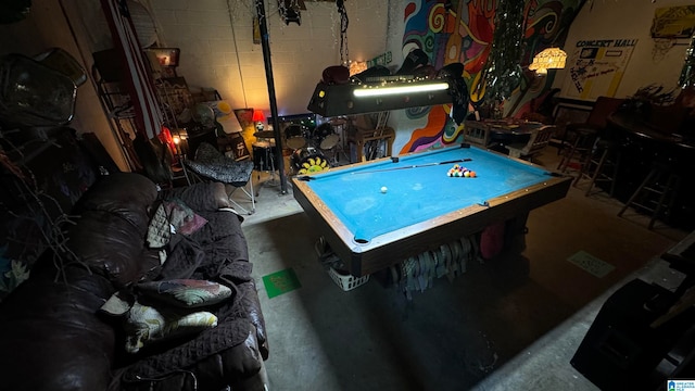 rec room featuring concrete floors and pool table